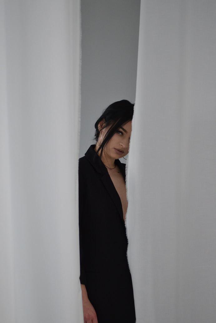 Stylish minimalistic photo of a girl in black